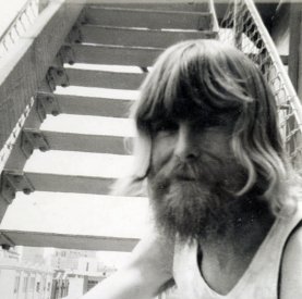 Mick Glasheen on the steps outside the Bush Video floor of the Fuetron Building, c.1973. [Photograph: Jodie Adams]