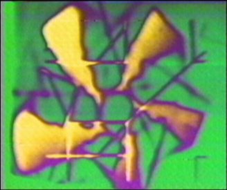 Frame from Video MetaProgramming One. Colourised computer graphic and feedback. (1974)