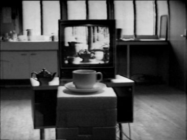 Frame from David Perry's Interior with Views (1976)